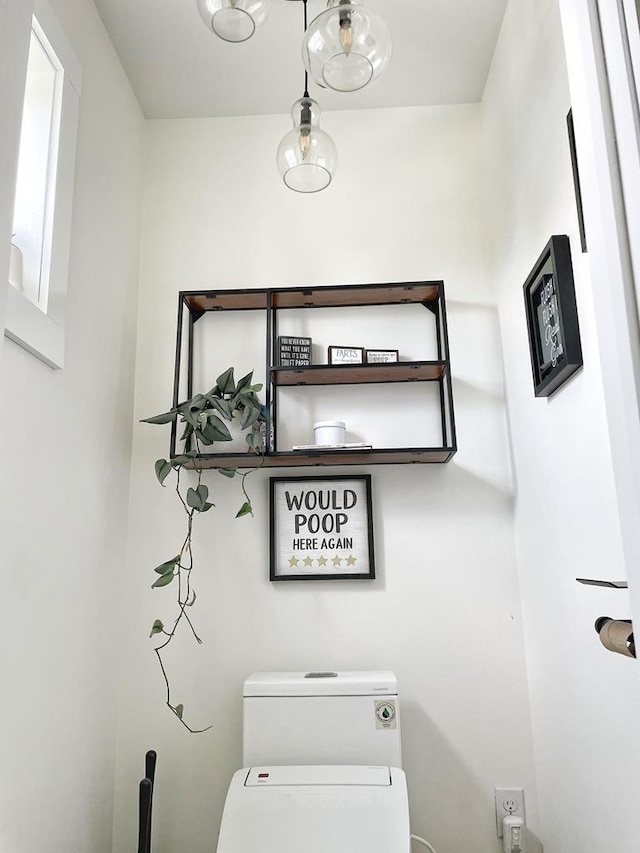 washroom featuring washer / dryer and laundry area