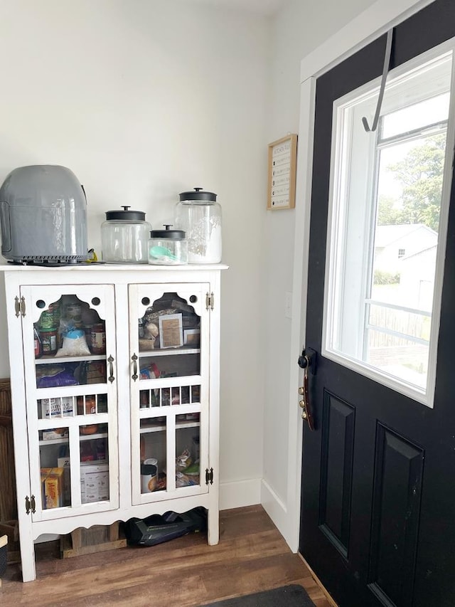 interior space with dark wood-type flooring