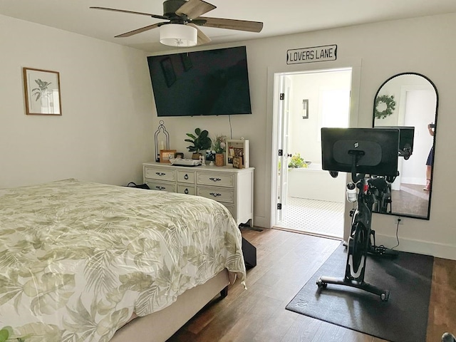 bedroom with ceiling fan and hardwood / wood-style flooring