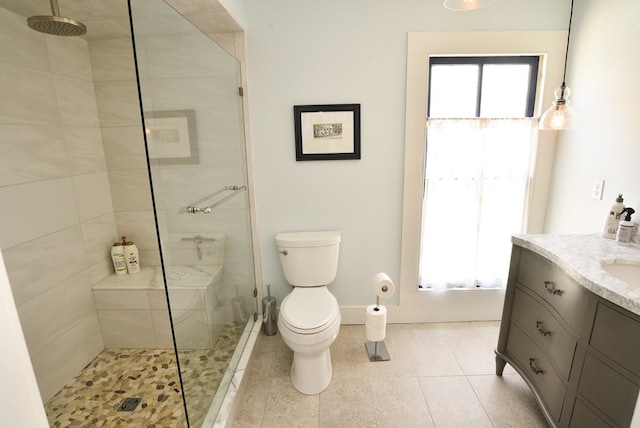 420 Randolph Ave, Cape Charles, VA 23310 - full bathroom featuring a tile shower, vanity, toilet, and tile patterned floors