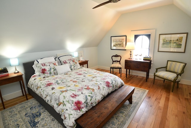 420 Randolph Ave, Cape Charles, VA 23310 - bedroom with lofted ceiling, wood finished floors, and baseboards