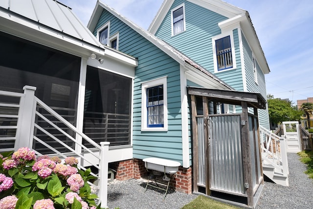 420 Randolph Ave, Cape Charles, VA 23310 - view of side of home with a sunroom