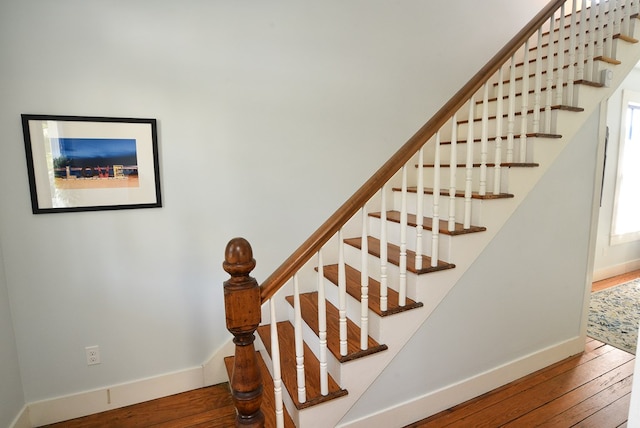 420 Randolph Ave, Cape Charles, VA 23310 - staircase with wood-type flooring and baseboards