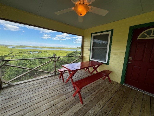 wooden terrace with ceiling fan