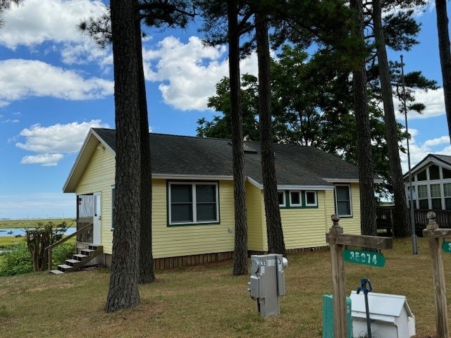 exterior space with a lawn