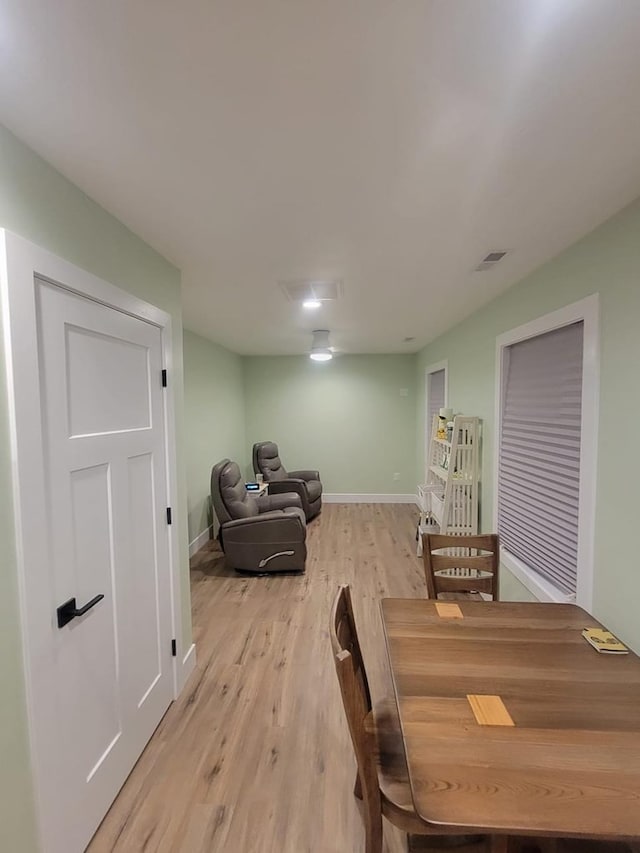 dining area with light wood-type flooring