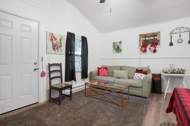 living room featuring hardwood / wood-style flooring, lofted ceiling, and a baseboard radiator