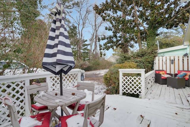 wooden deck with outdoor lounge area