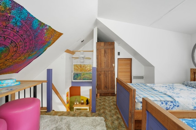 carpeted bedroom featuring vaulted ceiling