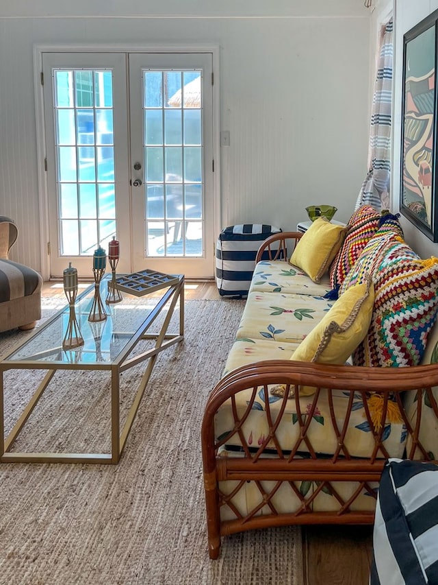 living room featuring hardwood / wood-style floors and french doors