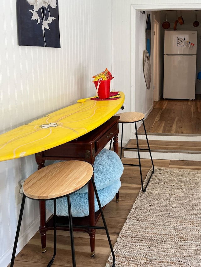 dining area with hardwood / wood-style flooring