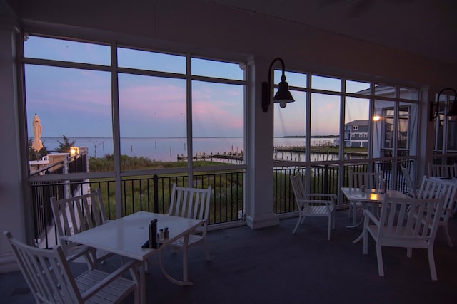 sunroom with a water view