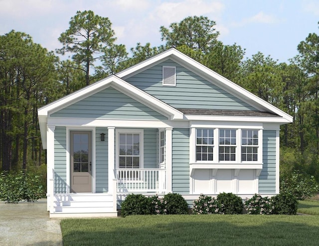 view of front of home featuring a front yard