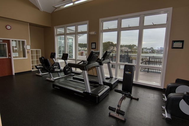 gym with vaulted ceiling