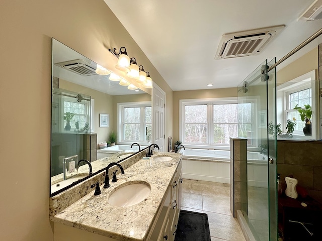 17481 Mitchell Ln, Parksley, VA 23421 - full bath with double vanity, a sink, and a garden tub