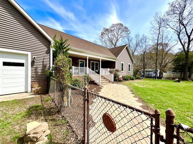 17481 Mitchell Ln, Parksley, VA 23421 - single story home with a front yard, an attached garage, fence, and a porch