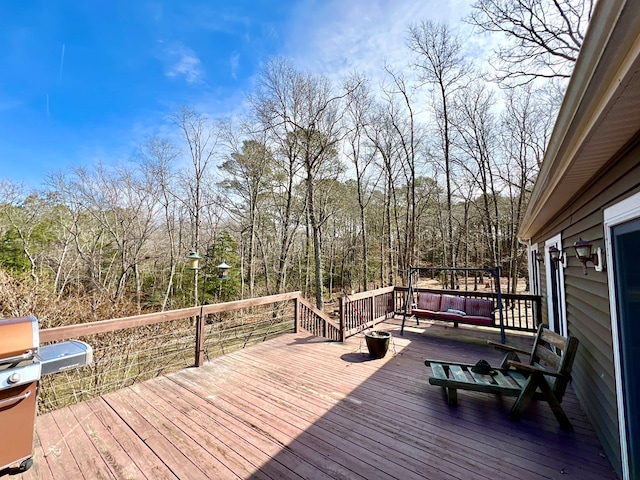 17481 Mitchell Ln, Parksley, VA 23421 - deck featuring grilling area and a forest view