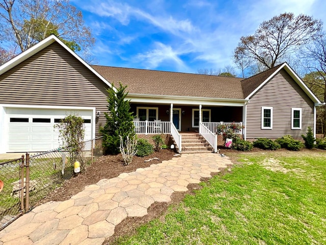 17481 Mitchell Ln, Parksley, VA 23421 - ranch-style house with roof with shingles, fence, an attached garage, a front lawn, and covered porch