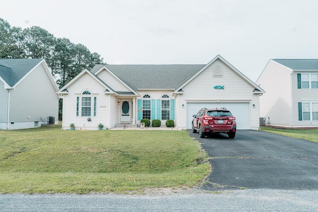 37275 Longboat Ct, Greenbackville, VA 23356 - view of front facade with asphalt driveway, a garage, and a front yard