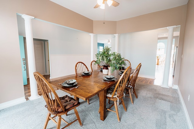 37275 Longboat Ct, Greenbackville, VA 23356 - dining area featuring decorative columns, a ceiling fan, and light carpet