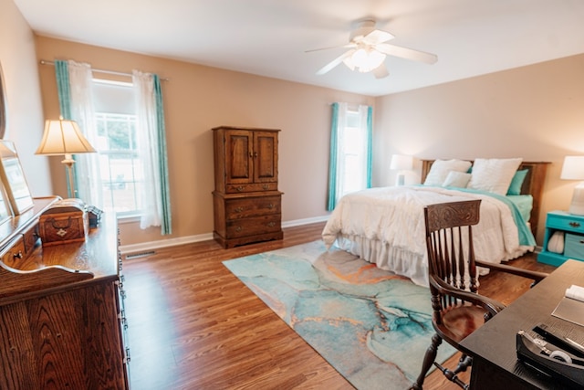 37275 Longboat Ct, Greenbackville, VA 23356 - bedroom featuring light wood-style floors and ceiling fan