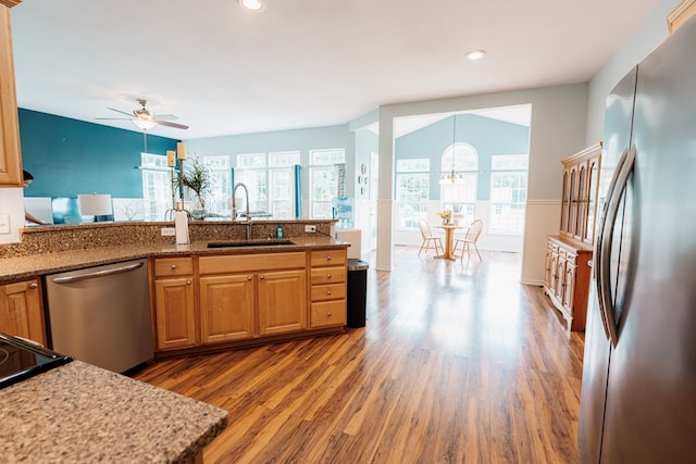 37275 Longboat Ct, Greenbackville, VA 23356 - kitchen featuring stainless steel appliances, ceiling fan, wood finished floors, plenty of natural light, and recessed lighting