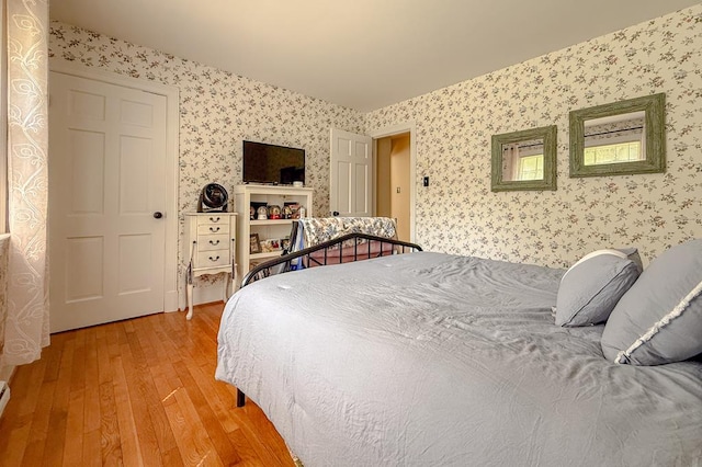 35197 Hillsborough Dr, Belle Haven, VA 23306 - bedroom with wallpapered walls and wood-type flooring