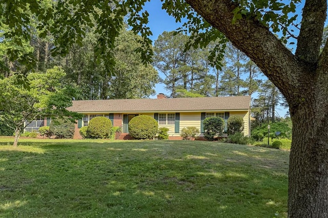 35197 Hillsborough Dr, Belle Haven, VA 23306 - ranch-style house featuring a front lawn and a chimney