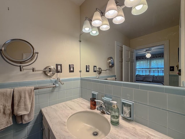 35197 Hillsborough Dr, Belle Haven, VA 23306 - bathroom featuring tile walls, a wainscoted wall, and vanity