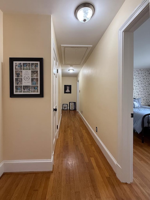 35197 Hillsborough Dr, Belle Haven, VA 23306 - corridor featuring attic access, hardwood / wood-style flooring, and baseboards
