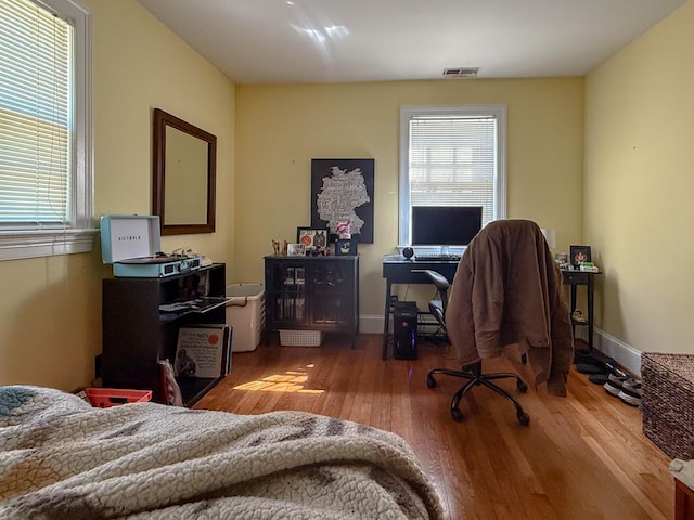 35197 Hillsborough Dr, Belle Haven, VA 23306 - bedroom featuring wood finished floors and an office area