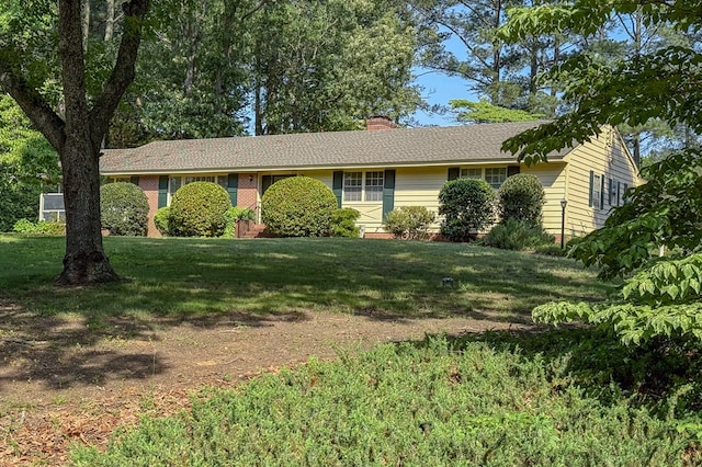 35197 Hillsborough Dr, Belle Haven, VA 23306 - ranch-style home with a chimney and a front yard