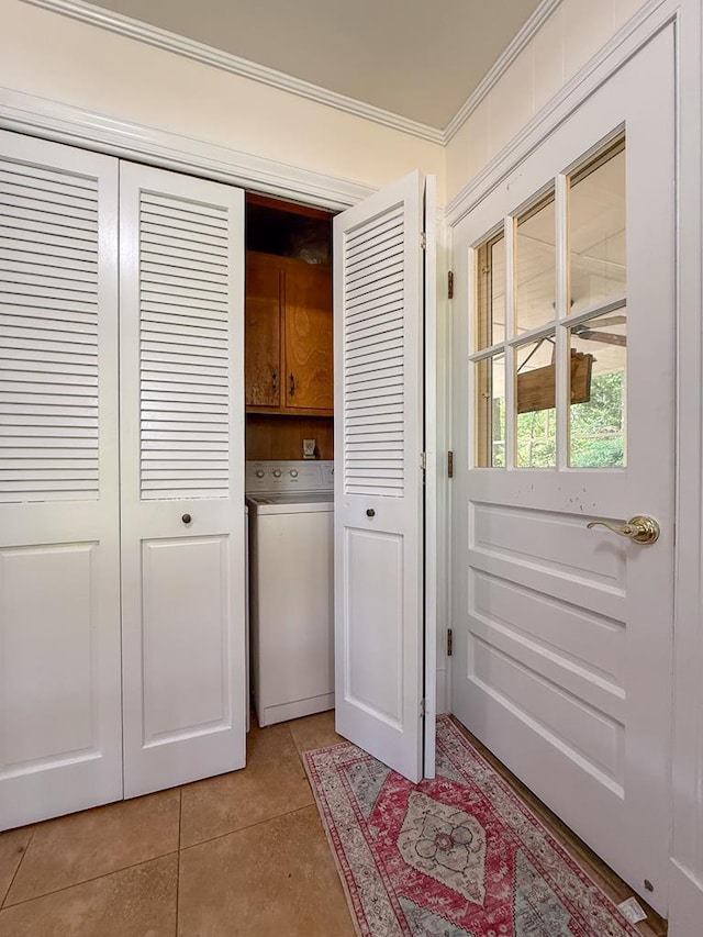 35197 Hillsborough Dr, Belle Haven, VA 23306 - laundry area with cabinet space, washer / clothes dryer, light tile patterned floors, and crown molding