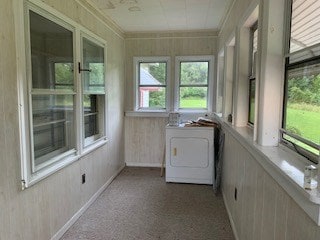 laundry area featuring washer / clothes dryer and crown molding