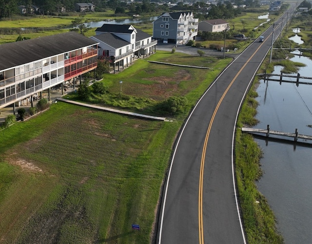 bird's eye view with a water view