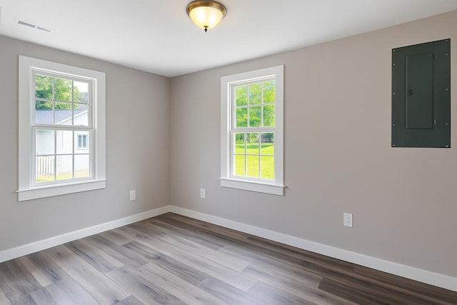3469 Willis Wharf Rd, Exmore, VA 23350 - unfurnished room featuring electric panel and wood finished floors