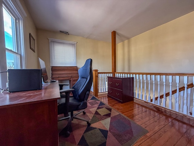 office space with hardwood / wood-style flooring