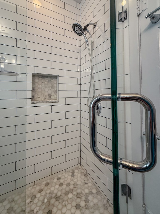 bathroom featuring a stall shower