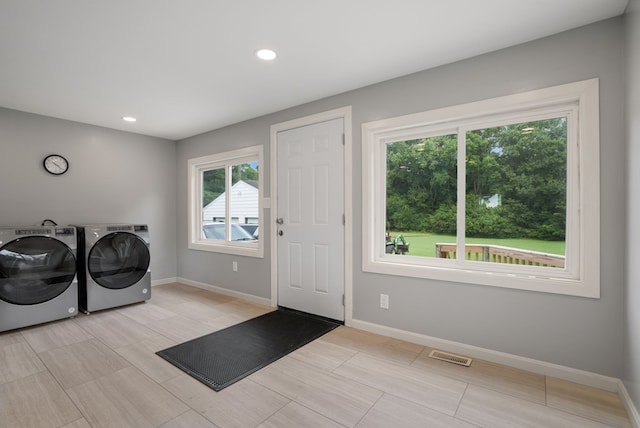 laundry room featuring washer and dryer