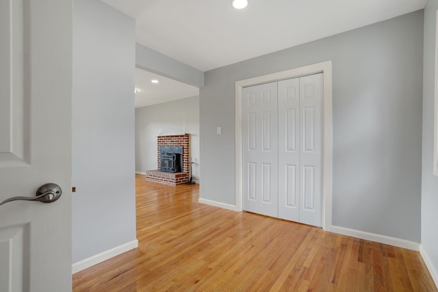 interior space featuring a closet and light hardwood / wood-style floors