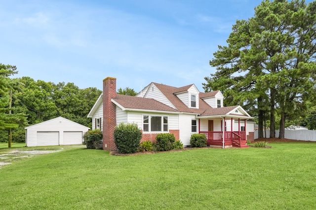 cape cod home featuring a garage, covered porch, an outdoor structure, and a front lawn