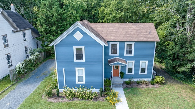 view of front of house featuring a front lawn