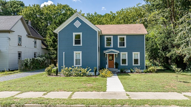 view of front facade featuring a front lawn