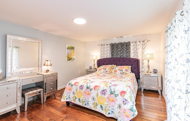 bedroom featuring wood-type flooring