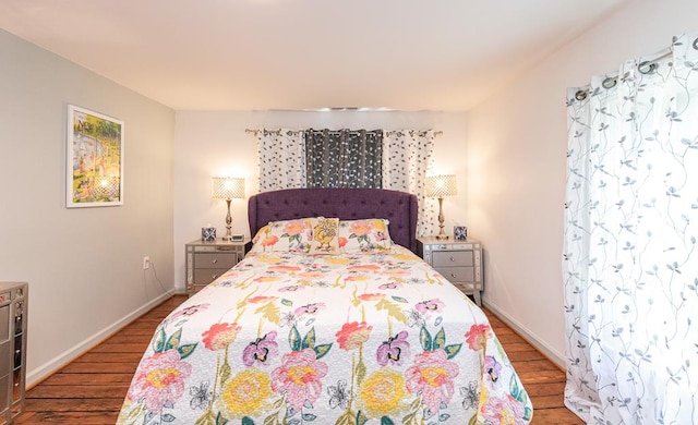 bedroom featuring wood-type flooring