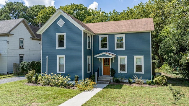 view of front of home with a front yard