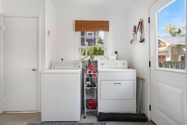 washroom with independent washer and dryer, laundry area, and crown molding