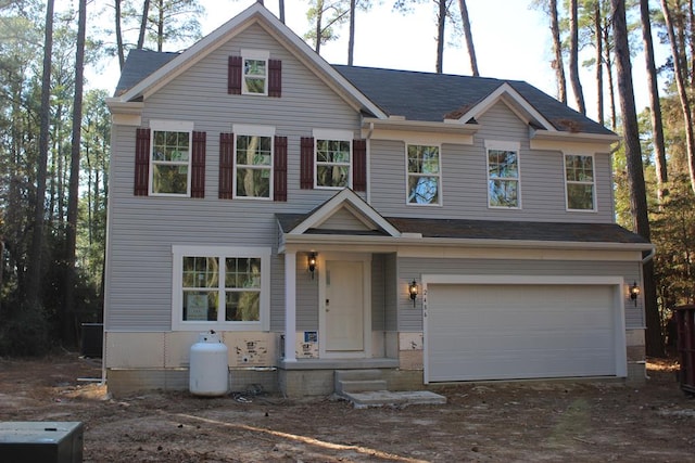 view of front of house with a garage