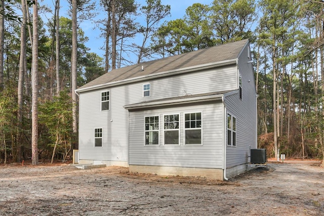 back of property with cooling unit