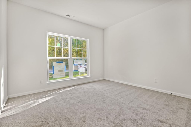 empty room with carpet flooring